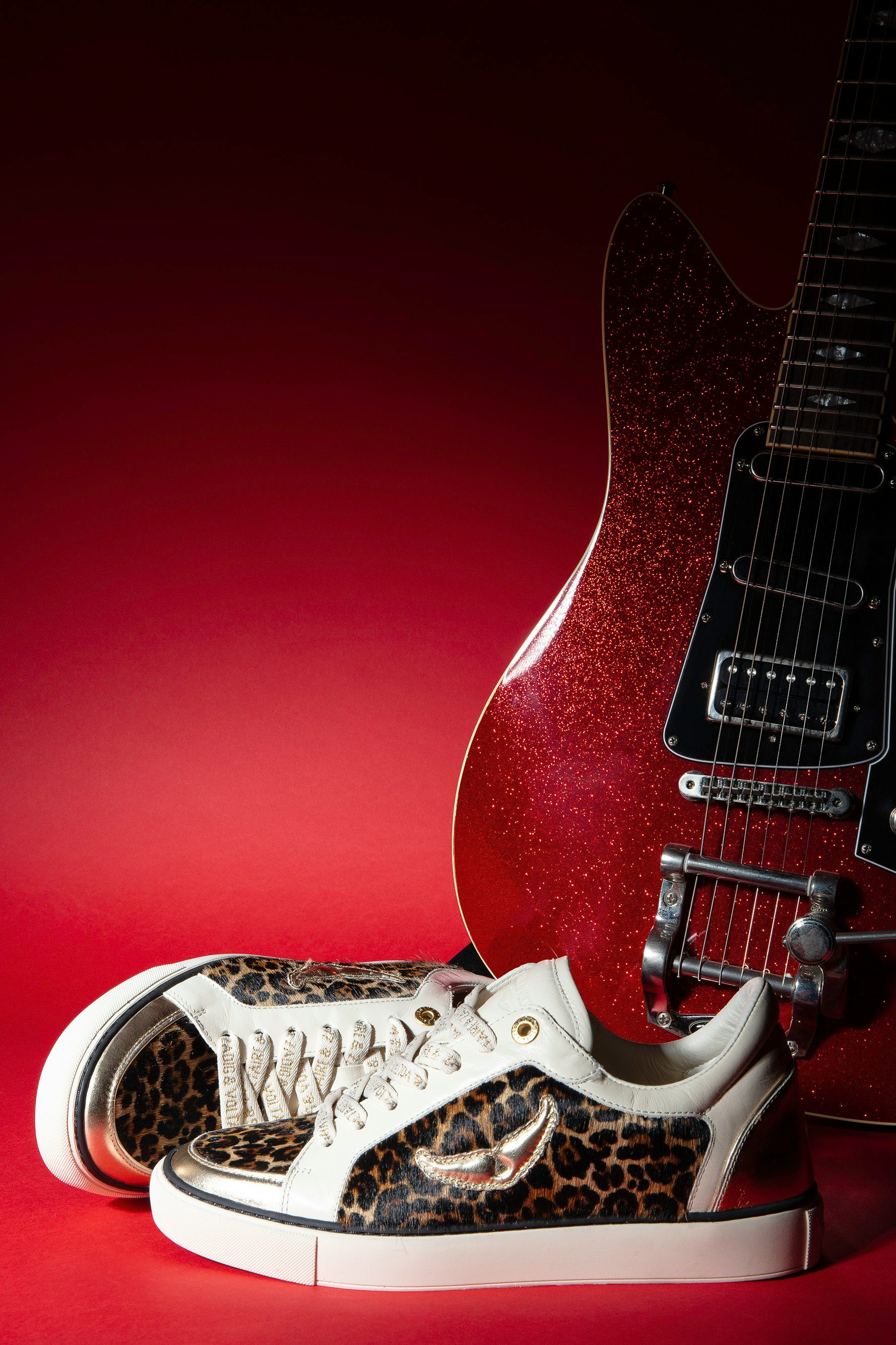 Low-Top Fly On Sneakers - Low-top sneakers in a mix of leopard-effect leather and crinkled leather with embossed wings.